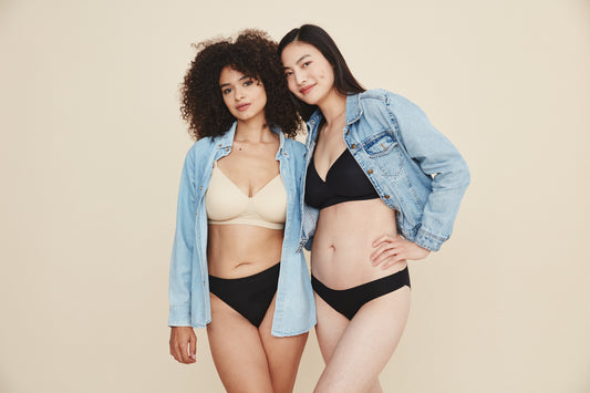 Models wearing black and buff bra with denim shirts on top.
