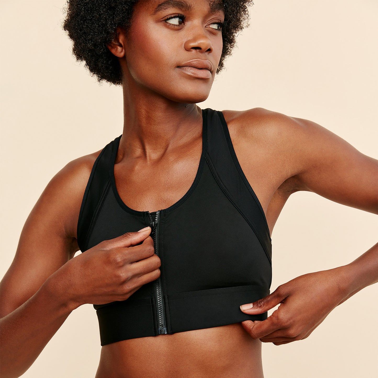 Picture of Black Front Closure Sports Bra Being Unzipped